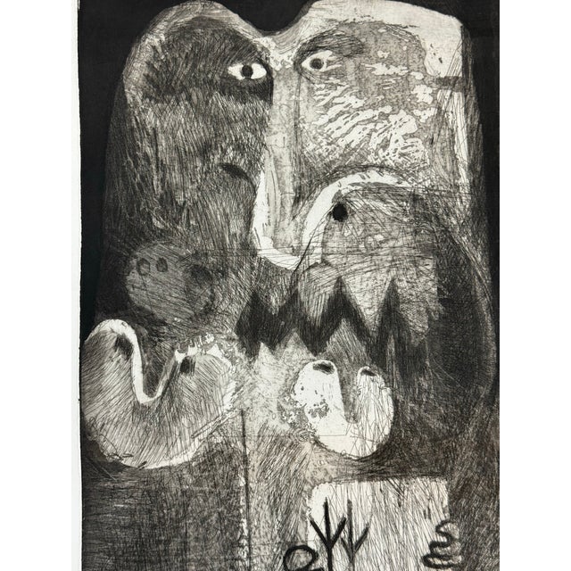 Mid 20th century original surrealist etching. Unsigned etching featuring fantastical beasts one if whom is clutching a...