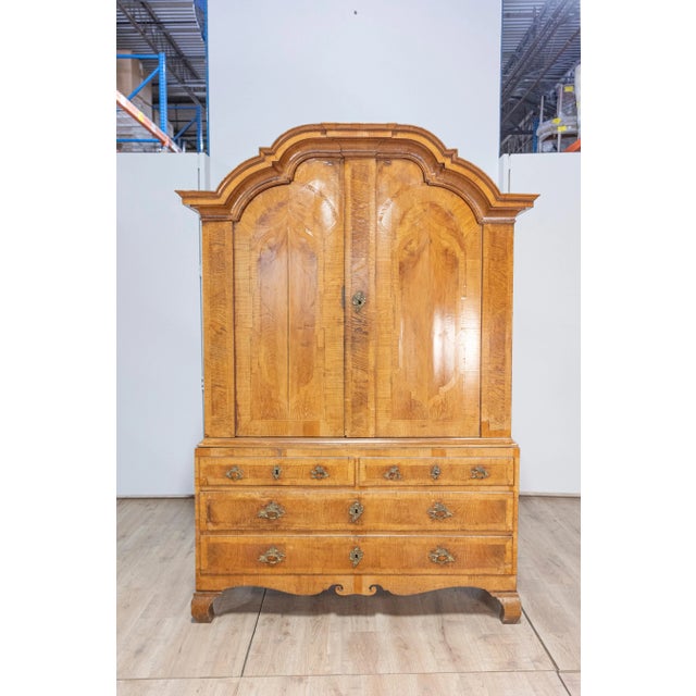 A Swedish Rococo cabinet from circa 1790 with doors and drawers. This exquisite Swedish Rococo cabinet from circa 1790...