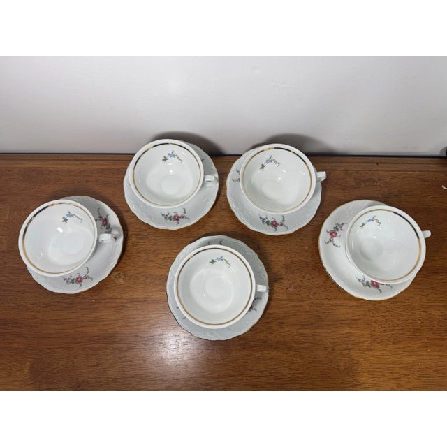 Vintage Wawel porcelain tea set, Made in Poland. Includes 5 footed teacups and 5 matching saucers (10 pieces). White...