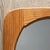 Vintage 1970s solid pine mirror. Its thick frame highlights the wood grain. The structure is composed of four assembled...