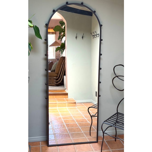 Add understated elegance to any space with this contemporary full-length floor mirror. Its slim steel frame and clean,...