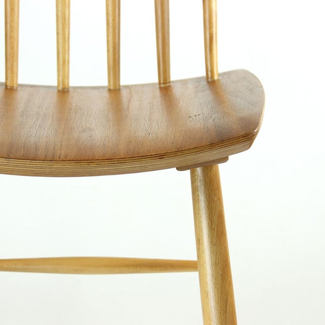 Beautiful vintage dining chair produced in oak wood. Label shows that the chair was produced in 1975. beautiful details...