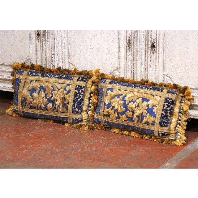 Decorate a sofa, bench, or antique daybed with this elegant pair of French decorative bolster pillows. Each pillow is made...