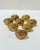 Set of eight vintage solid brass place card holders shaped like scallop shells. Each features a textured shell design with...