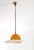 A splendid venini pendant lamp, made in italy around the 1970s, crafted from fine amber and white murano glass in the...