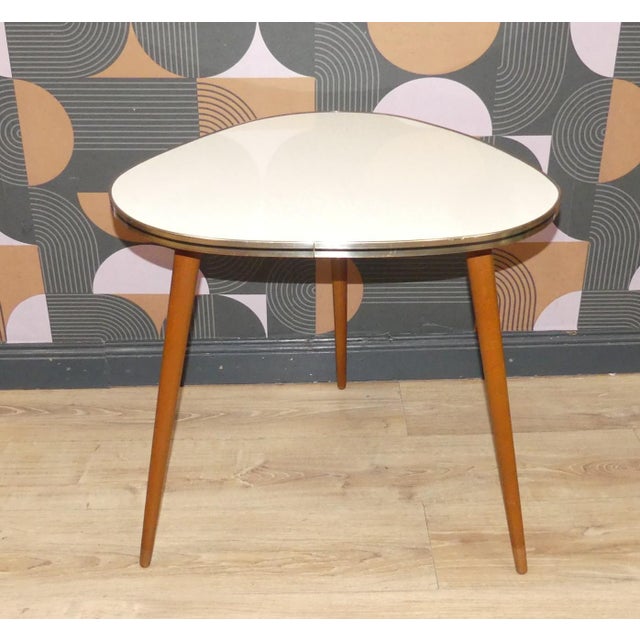 Beautifully shaped table Side table/Coffee table COCKTAIL TABLE Charming 1950s relic from the Rock 'n' Roll era On three...