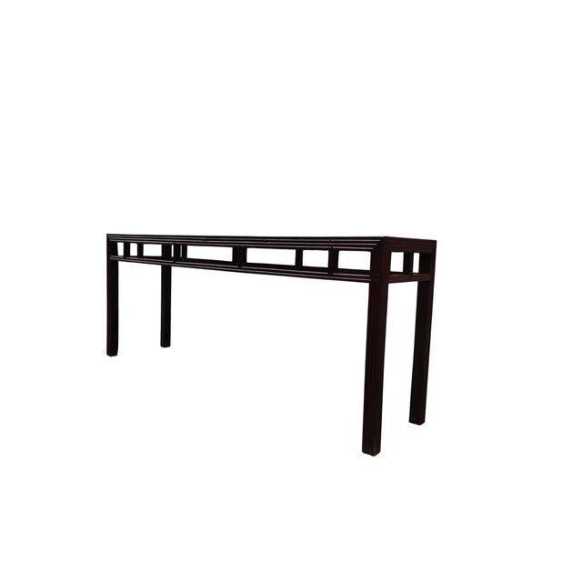 This 19th century 88" long elm console table is distinguished by special openwork lattice detailing underneath the...