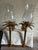 Hollywood regency style, heavy brass candle sconces with glass shades. Solid brass palm tree form. Great looking and great...