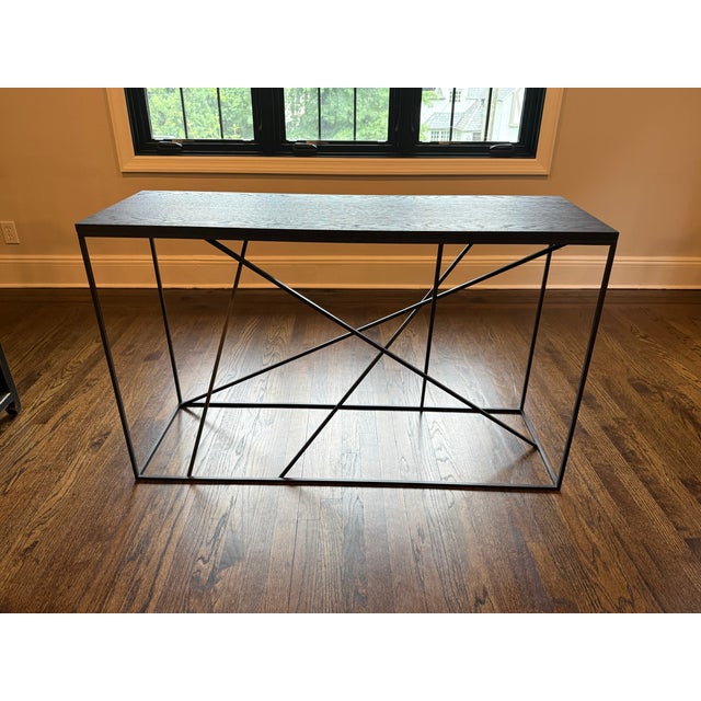 Michael Dawkins Mikado Console Table - Black Matte Wood Top with Black Metal Base Architectural elegance meets functional...