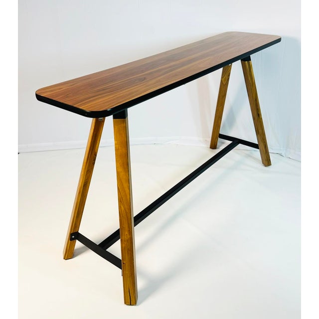 Elegant and versatile Reff Profiles™ bar-height table by Knoll, expertly crafted in Canada in 2018. This modern walnut...