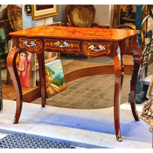 Add timeless French elegance to your home with this beautifully crafted console table, featuring a refined rectangular...