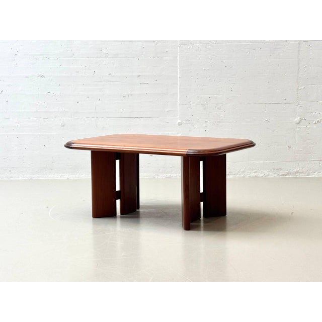 This distinctive coffee table from the 1970s impresses with its warm appeal and striking design. The rectangular tabletop,...