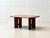 This distinctive coffee table from the 1970s impresses with its warm appeal and striking design. The rectangular tabletop,...
