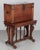 An early 19th century Spanish vargueno, or portable desk, made of hand-planed solid walnut. The drop front opens to an...