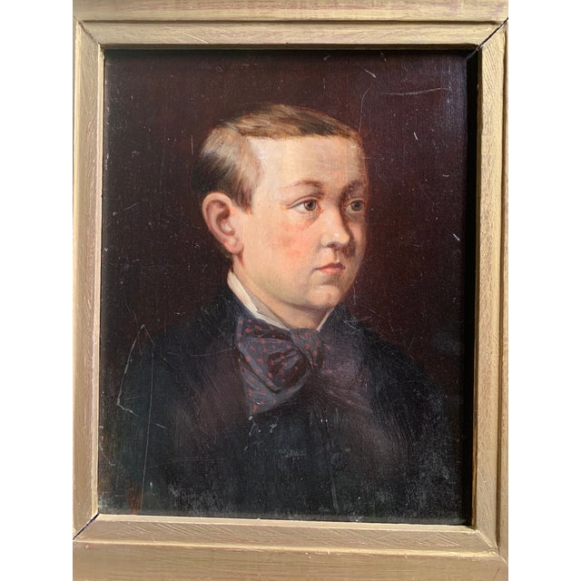 19thC English framed oil on wood portrait of a boy. Wonderful clair obscur with red polka dot ascot! A great addition to...