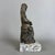 A refined devotional figure, characterized by solemn composure and mounted on a solid stone base. · subject and style:...