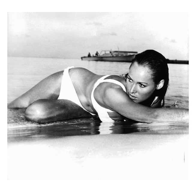 Ursula On The Beach 1962 Portrait of Ursula Andress in a bikini lying in the waves on the beach, in James Bond film ‘Dr....