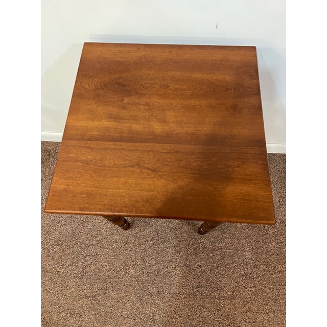 A beautiful example of a Sheraton one drawer American side table with a tiger maple drawer front and cherry top and legs....