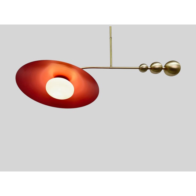 Illuminate your space in style with this stunning pink color brass chandelier. Crafted with a single light and adorned...