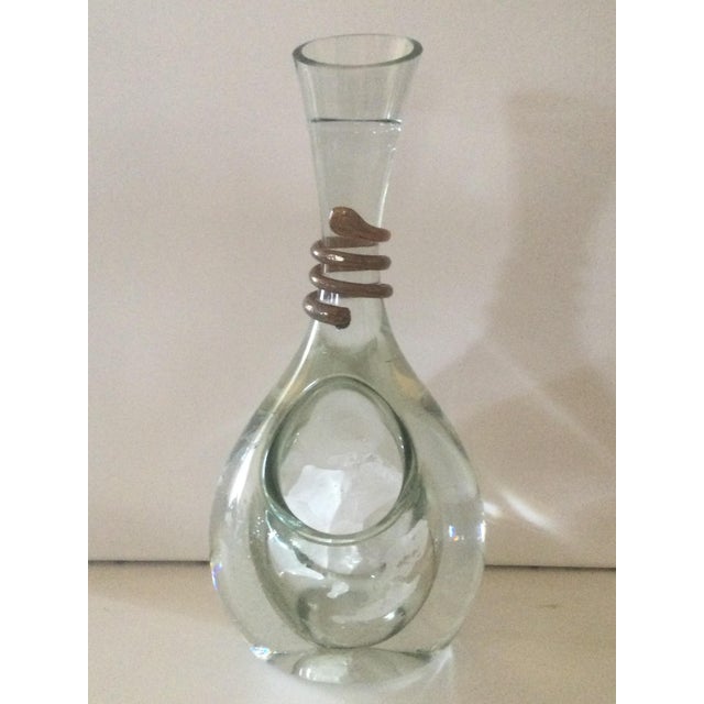 Carafe with an ice pack for optimal cooling without diluting your drinks… wines, juices, etc. Entirely handmade from blown...