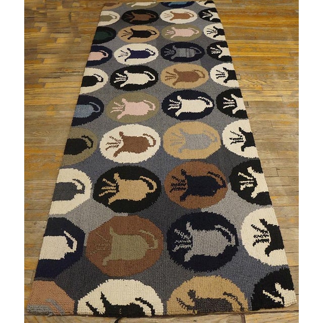 Antique American hooked rug, size: 3'1" x 8'9".