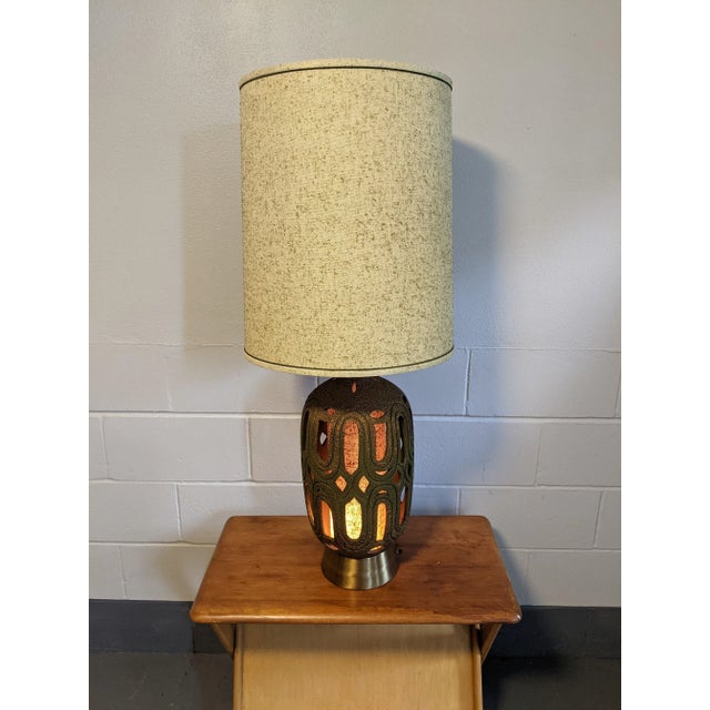 Large vintage Honi Chilo lamp with original shade, circa 1970s. Gold or brass colored base, textured. Switches on base and...