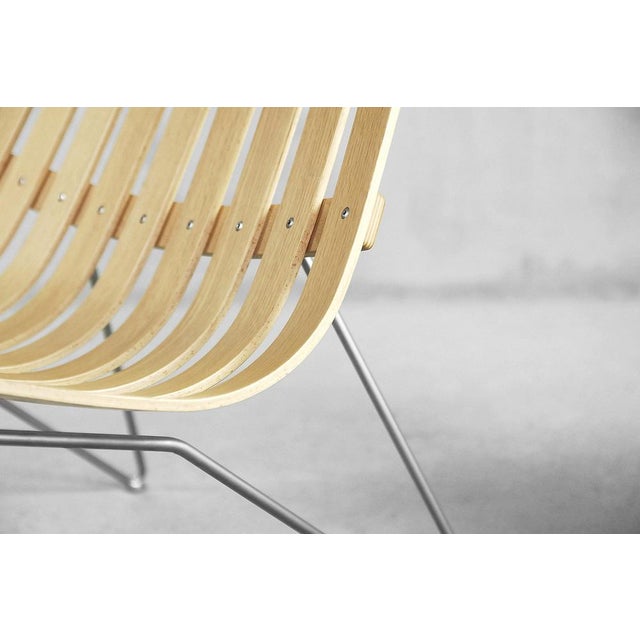 An elegant and modern Scandia lounge chairs. This model was designed by Hans Brattrud in 1957. This pair of chairs was...