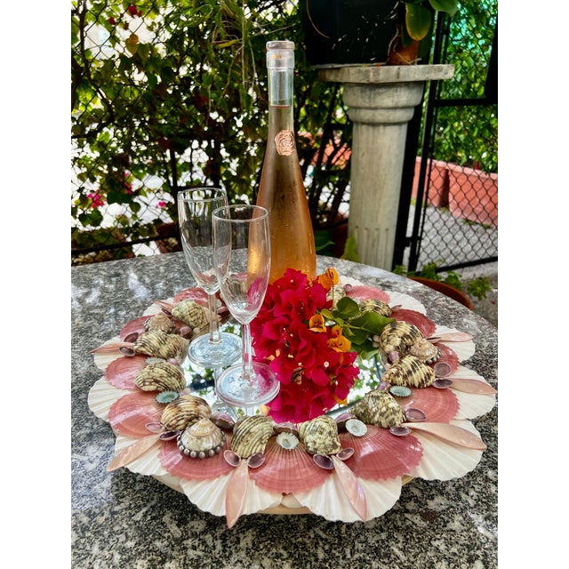Fun CSS Shell Lazy Susan with a mirrored center. Perfect for a casual or formal setting. Special shells in beautiful hues...