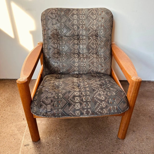 Danish modern teak arm chair with geometric black and metallic upholstery circa 1970s