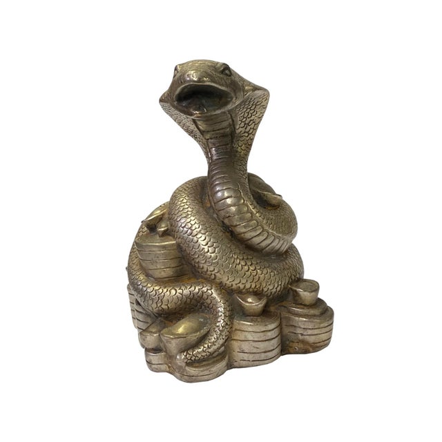 This is a Chinese Fengshui snake on an ingot figure made of metal in a distressed vintage silver pewter color with a...