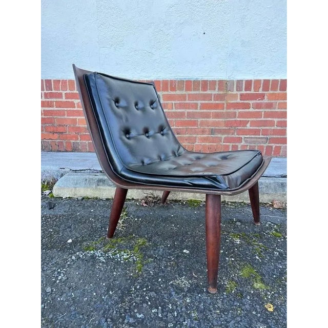 Mid Century Scoop Lounge Chair by Carter. Brothers Inc , 1958s . The design consists of bent plywood frame with black...