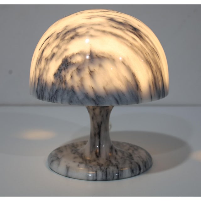 This is such a great looking lamp. Made of solid marble. Creates great mood lighting. Small Tulip Shaped Marble Table...