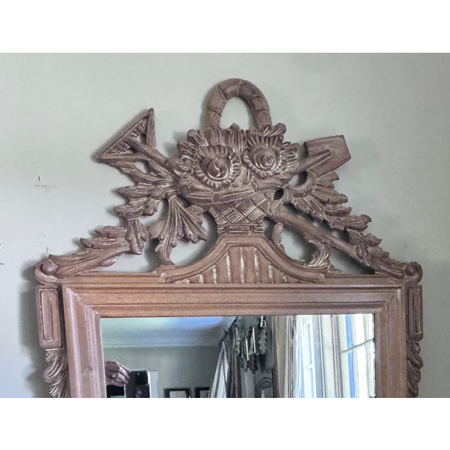 Gorgeous French provincial style carved wood mirror with garden tools and basket by LaBarge of Italy. The mirror a...