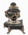 An exceptional French bloodstone and sterling silver mounted inkwell, dating to circa 1920, distinguished by its elaborate...