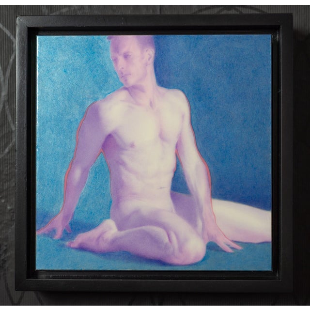 This artwork features a seated figure rendered in soft hues of pink and blue, creating a serene and introspective...