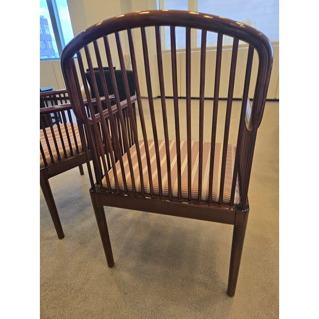 This pair of Stendig Davis Allen Andover Chairs features a bold, architectural frame paired with maroon striped upholstery...