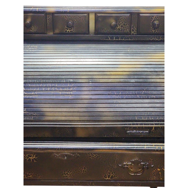 Super early 20th century tambour roll top desk redone in black and gold crackle finish, in excellent condition. Two...