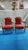 This listing features a pair of red giltwood Louis XVI style pair of chairs, likely originated from France circa 20th...