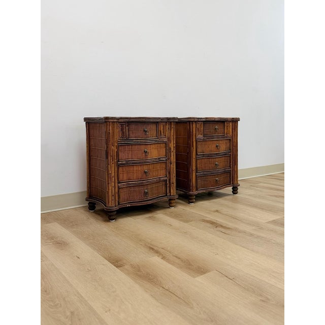 This handsome pair of vintage split bamboo and reed nightstands are a beautifully crafted British Colonial and tropical...