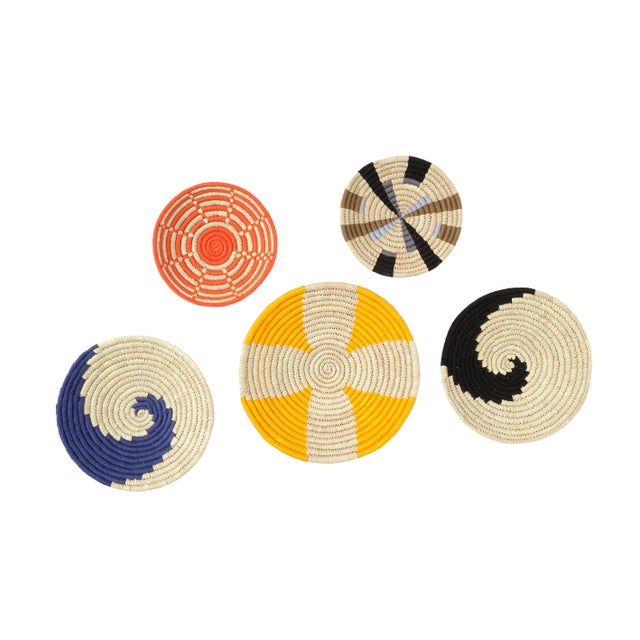 Add a pop of color into your space with our handmade woven wall basket. Whether used as wall decor or a functional basket,...