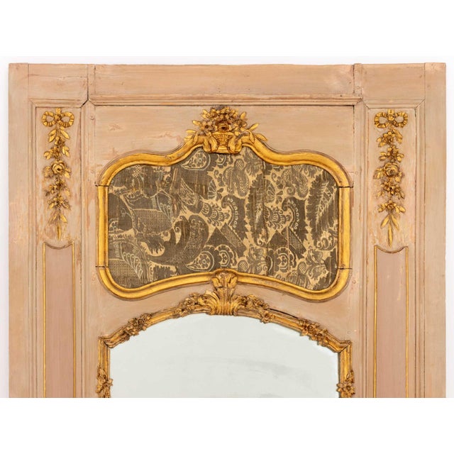 Louis XV Dusty Rose Pink Painted and Giltwood Trumeau Mirror, second half 18th century, with framed silk damask textile...