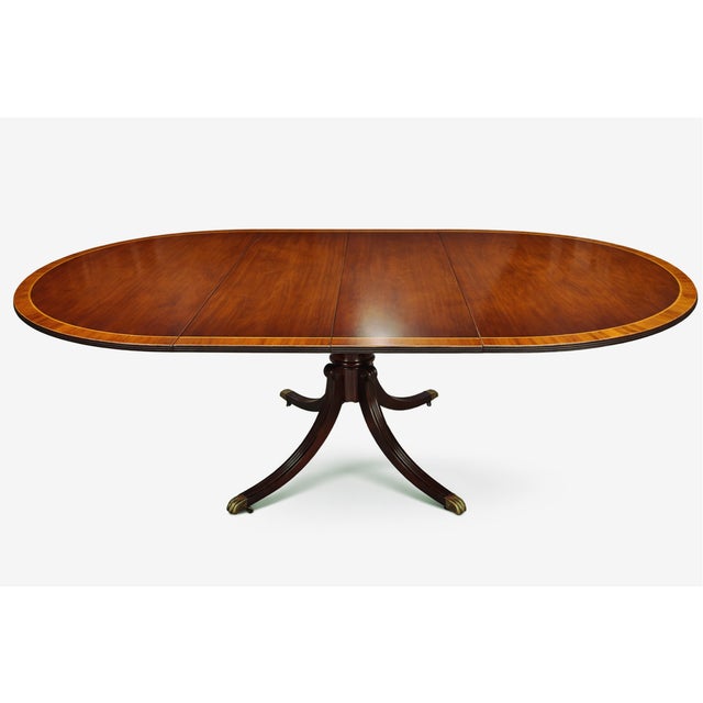 English Regency Revival Flame Mahogany Oval Extension Dining Table With Satinwood Crossbanding and Brass Paw Feet, Circa 1935 For Sale - Image 4 of 9