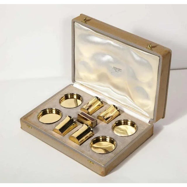 Hermes Paris & Ravinet d’Enfert, a rare French silver-gilt smoking set, circa 1930. MARK OF Ravinet D’Enfert, PARIS, 20TH...