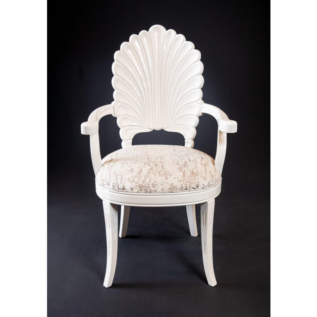 Six Italian regency painted walnut shell back dining chairs made in the Venetian grotto style. These chairs feature...
