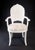 Six Italian regency painted walnut shell back dining chairs made in the Venetian grotto style. These chairs feature...