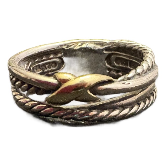 Classic David Yurman Jewelry! This set of Sterling Silver & 18k yellow gold crossover rings. The bands are bonded /welded...