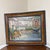This original, artist-signed vintage oil painting is a charming landscape of a European canal or fishing village. The...
