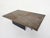 Stone coffee table on two L-shaped metal plates. Designed and signed by artist Paul Kingma. Paul Kingma Paul Kingma, born...