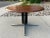 Vintage segmented aluminum group action office style round dining or conference table after George Nelson. Manufactured in...