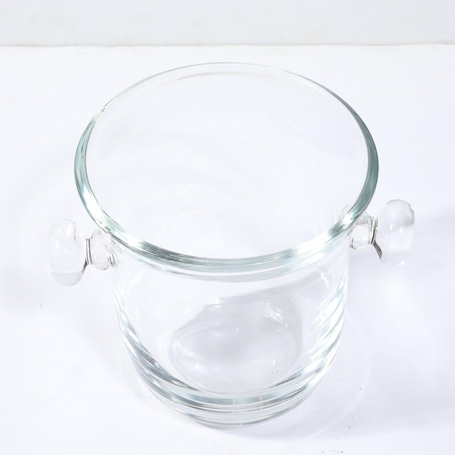 This rare and materially exquisite Mid-Century Modernist Glass Ice Bucket Signed Karl Springer originates from the United...
